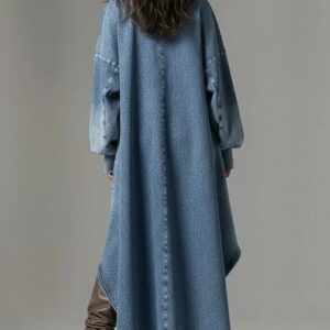 robe salopette en jean bleue de profil