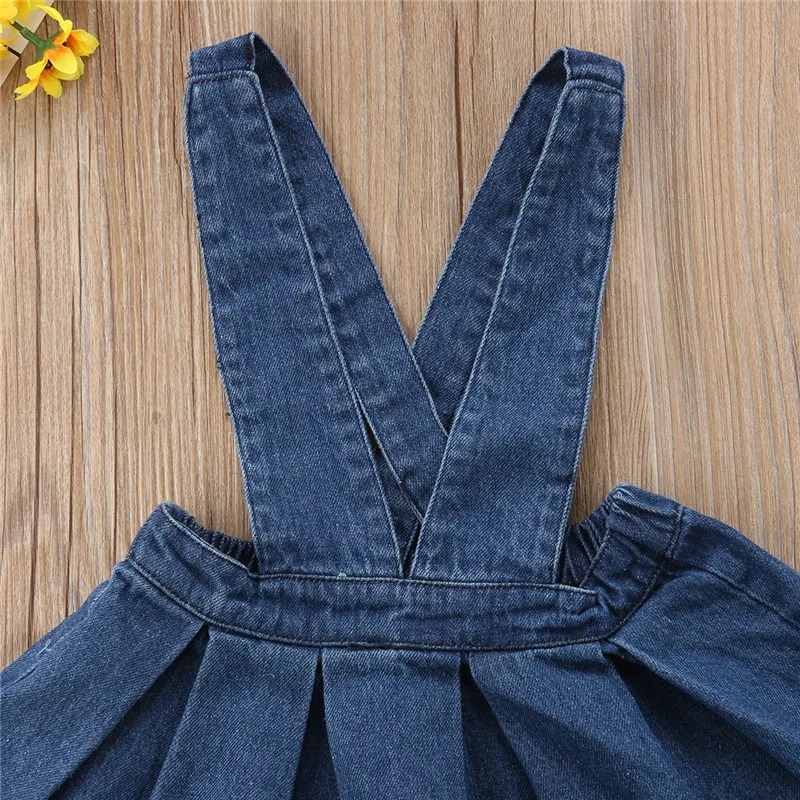 salopette fille en denim détail bretelles